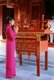 Vietnam: A woman at an altar behind the Great House of Ceremonies, Temple of Literature (Van Mieu), Hanoi